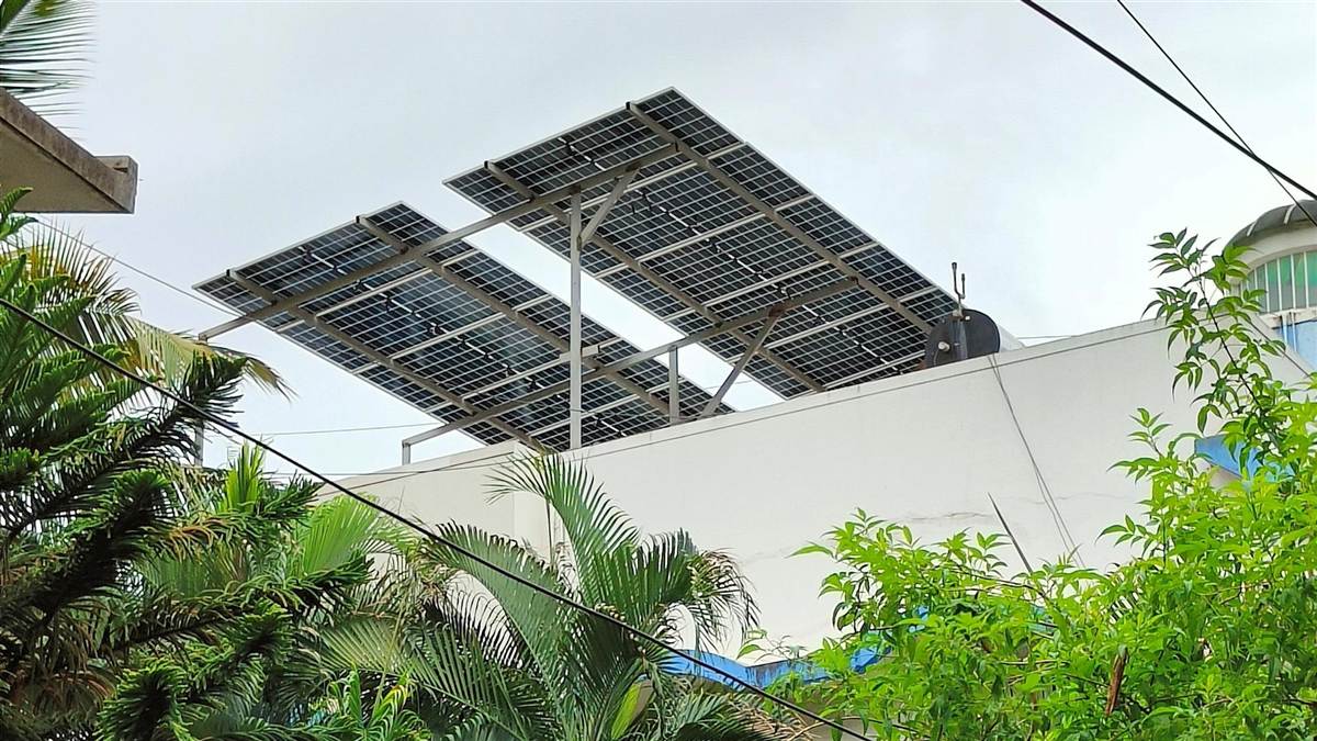 A ground-mounted solar structure array in an open field.